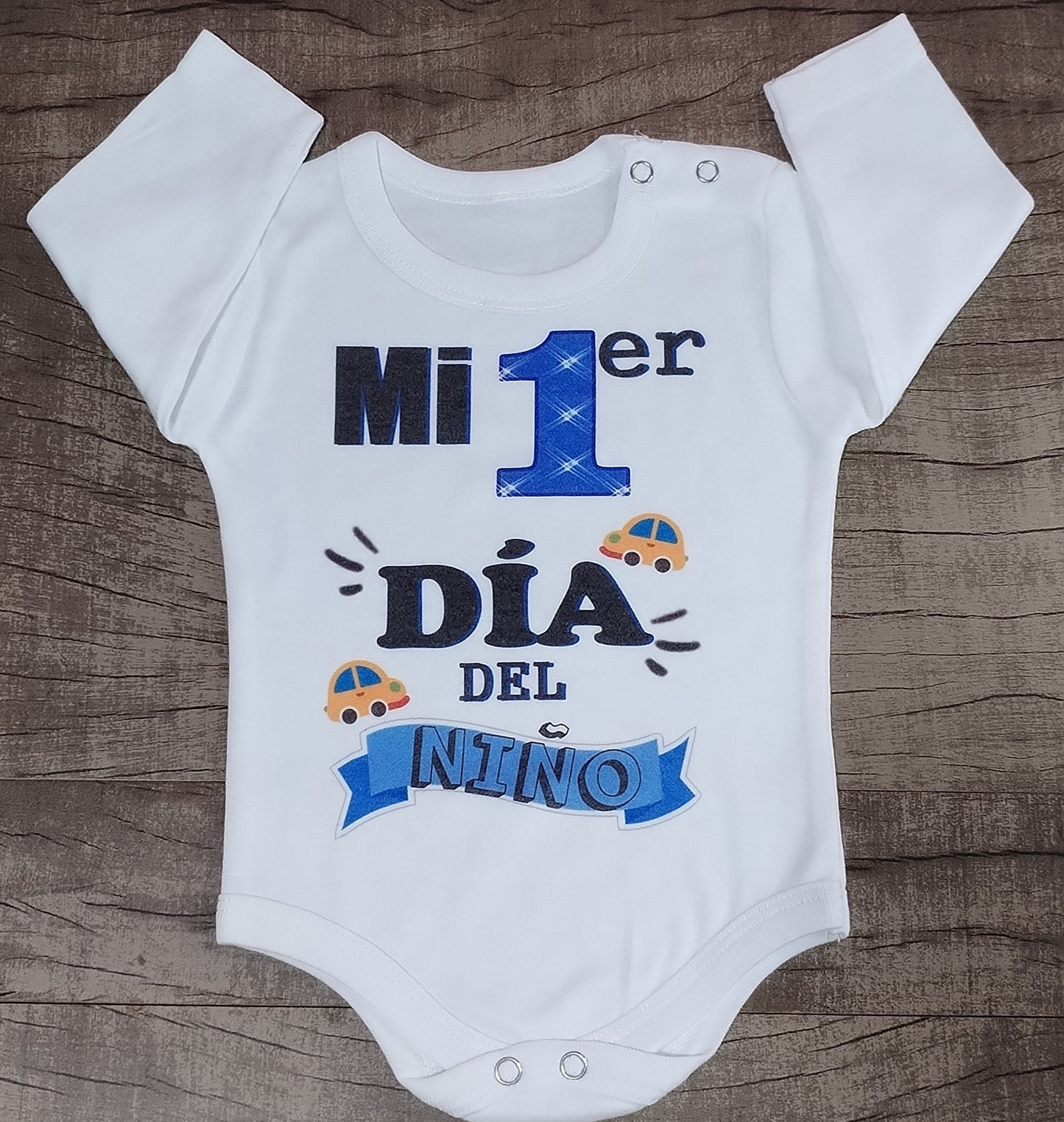 Body mi 1er día del niño (talle 0 manga larga)
