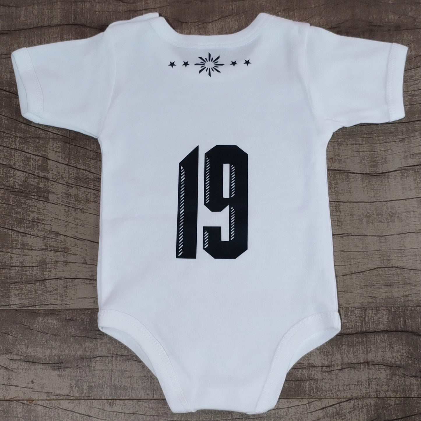 Body Uruguay talle 0 manga corta estamapdo con vinilo textil n° 19