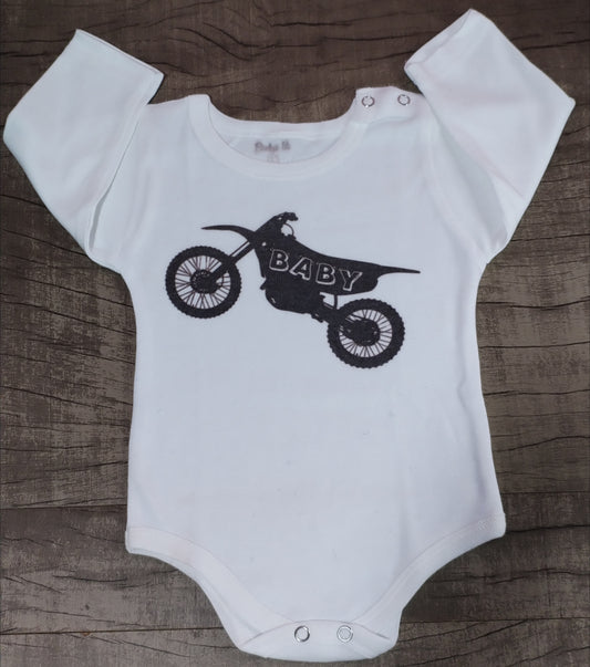 Body moto baby (quedo con una pelusa en la tela) talle 3 manga larga
